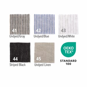 May include: A collection of fabric swatches in various colors and patterns. The swatches include striped designs in gray, blue, and white, as well as solid black and undyed linen. The text on the swatches reads "Undyed/Gray", "Undyed/Blue", "Undyed/White", "Striped Black", and "Undyed Linen".