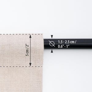 Close-up of a curtain on a rod showing the rod pocket and rod measurements, highlighting details for kitchen, bathroom, and cabinet curtains made of linen fabric