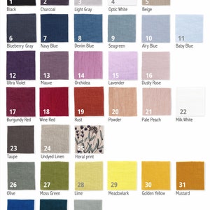 A color chart with 34 different fabric swatches ranging from Black, Charcoal, and Light Gray to various shades of Blue, Violet, Red, Green, Yellow, and a Floral print.