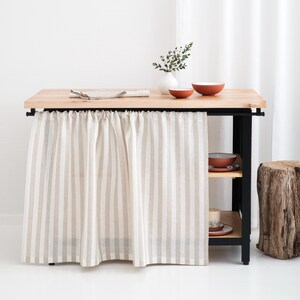 Light and bright room with a kitchen cabinet featuring a rod pocket curtain made of striped natural linen fabric, suitable for windows in kitchens, bathrooms, and living rooms