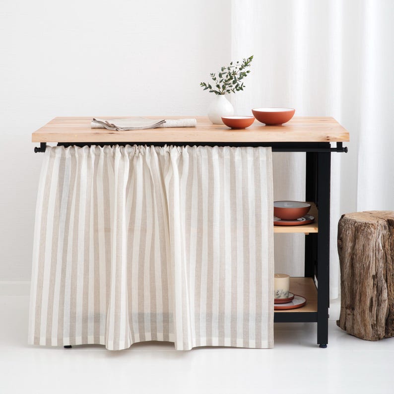 Light and bright room with a kitchen cabinet featuring a rod pocket curtain made of striped natural linen fabric, suitable for windows in kitchens, bathrooms, and living rooms