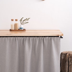 Custom-sized, eco-friendly natural linen curtain in stonewashed grey, perfect for kitchen cupboards or bathroom shelves, OEKO-TEX certified.
