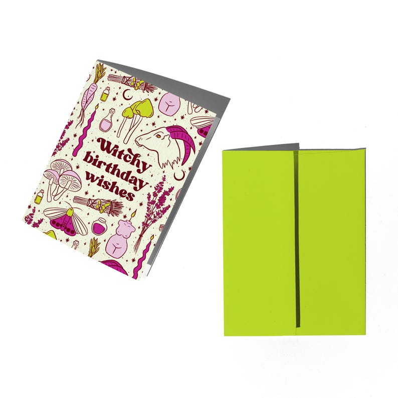 May include: A white card with a pink and brown illustration of a goat, mushrooms, and other witchy items. The text "Witchy birthday wishes" is written in a pink and brown font.