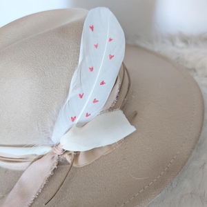 Red Heart Hat Feathers! White feathers with hand painted red glitter hearts. Custom Feather for your hat.