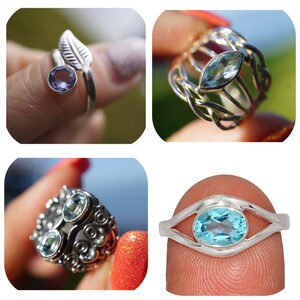 May include: Four silver rings with different designs and blue and purple gemstones. The rings are shown on fingers.