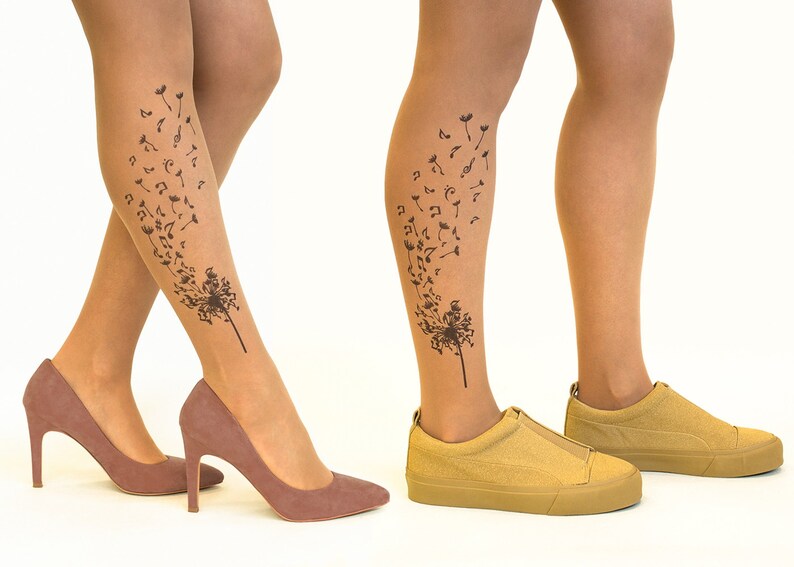 May include: Two pairs of nude tights with a black dandelion design featuring musical notes. One pair is worn with brown heeled shoes, the other with tan sneakers.