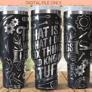May include: Black insulated tumbler with a white rim and handle, featuring a silver design of tools and gears. The text "THAT IS WHAT I DO I FIX THINGS AND KNOW STUFF" is displayed on the tumbler.