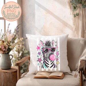 a cozy living room with a white pillow on a chair, a vase of flowers, and a book on a table.