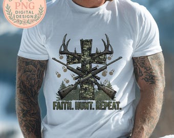 May include: White t-shirt featuring a camouflage cross with deer antlers, two rifles, and the text "FAITH. HUNT. REPEAT." The design includes a forest scene and paw prints. The shirt has a round neckline and short sleeves.