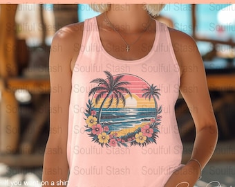 May include: A light pink tank top featuring a tropical sunset design. The graphic includes palm trees, ocean waves, and flowers within a circular frame. The text "DIGITAL FILE ONLY" is at the top.