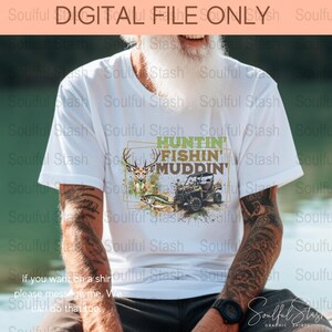 May include: White t-shirt with a green, brown and black graphic design featuring a deer, a fish and an ATV. The graphic text reads "Huntin' Fishin' Muddin'".