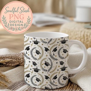 A white mug with a pattern of black graduation caps and laurels sits on a beige blanket, with a pink circular logo in the background that reads "Soulful Stash Png Digital Design".