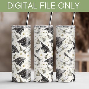 three cylindrical tumblers with a graduation cap and tassel pattern printed on them.
