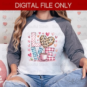 May include: A white raglan top with grey sleeves, displaying the word "LOVE" in a watercolour design. The "L" is pink with white polka dots, the "O" is a leopard print heart, the "V" is blue plaid, and the "E" is pink gingham. A pink coffee cup is included.