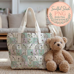 A beige teddy bear sits next to a white tote bag with a floral pattern, both placed on a beige carpeted floor.