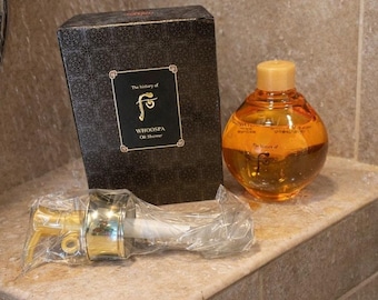 La historia de Whoo Whoospa: aceite de ducha corporal coreano de lujo con caja y dispensador