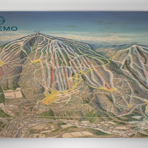 May include: A vintage-style illustration of a ski resort called "Okemo" with a detailed map of the mountain and ski trails. The map shows the different runs, lifts, and other features of the resort. The illustration is in a warm color palette with shades of brown, green, and blue.