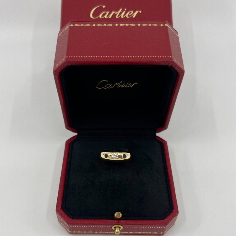 Cartier Diamond And Blue Sapphire 18k Yellow Gold Three Stone Dome Daphne Ring