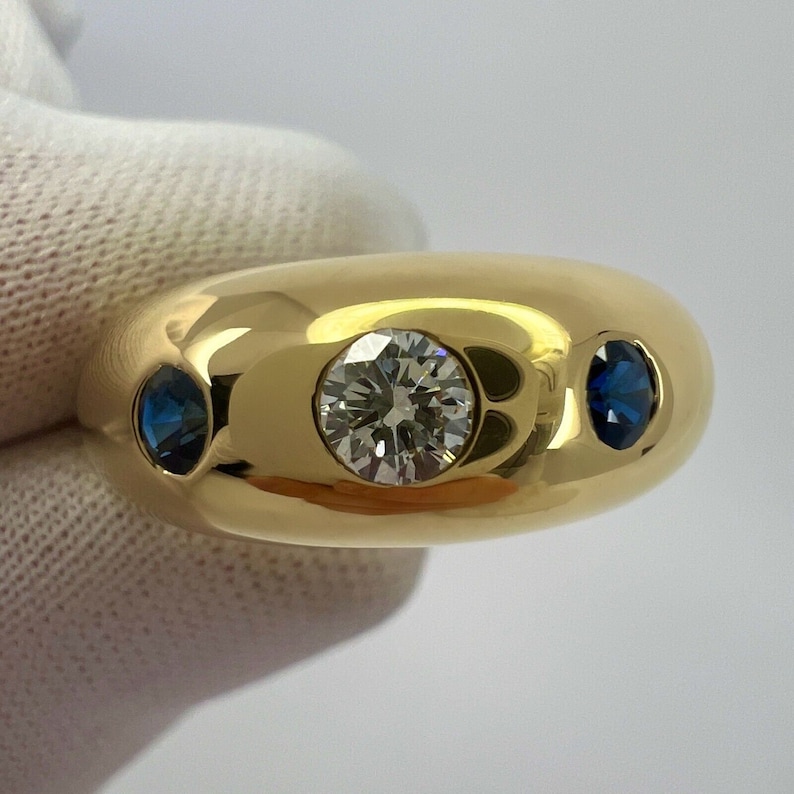 Cartier Diamond And Blue Sapphire 18k Yellow Gold Three Stone Dome Daphne Ring