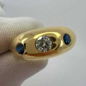 Cartier Diamond And Blue Sapphire 18k Yellow Gold Three Stone Dome Daphne Ring