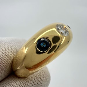 Cartier Diamond And Blue Sapphire 18k Yellow Gold Three Stone Dome Daphne Ring