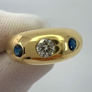 Cartier Diamond And Blue Sapphire 18k Yellow Gold Three Stone Dome Daphne Ring