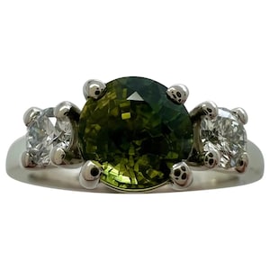 IGI Certified Untreated Bi Colour Sapphire and Diamond Three Stone Platinum Ring