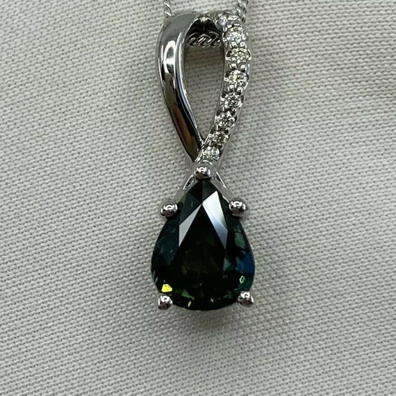 Pendentif Coeur En Or 18 Carats Avec Saphir Bleu Et Diamants Sur La Bélière - Bijou Occasion élégant
