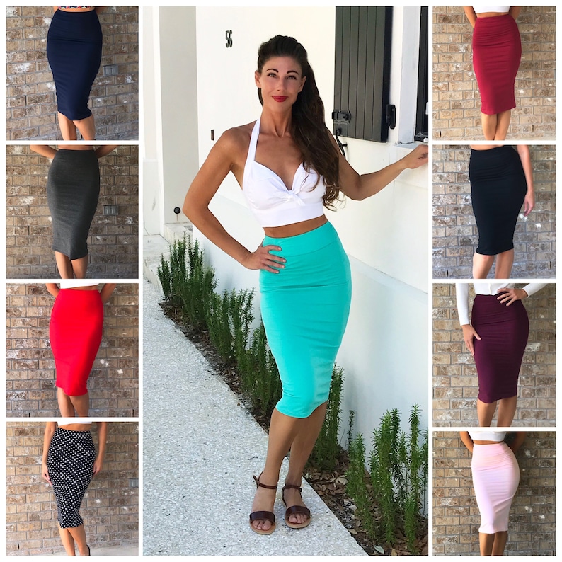 May include: A collage of ten images showcasing different colours of a fitted midi skirt. The skirt is made of a stretchy, form-fitting fabric and has a high waist. The colours shown are navy blue, grey, red, turquoise, black, burgundy, pink, and black with white polka dots.