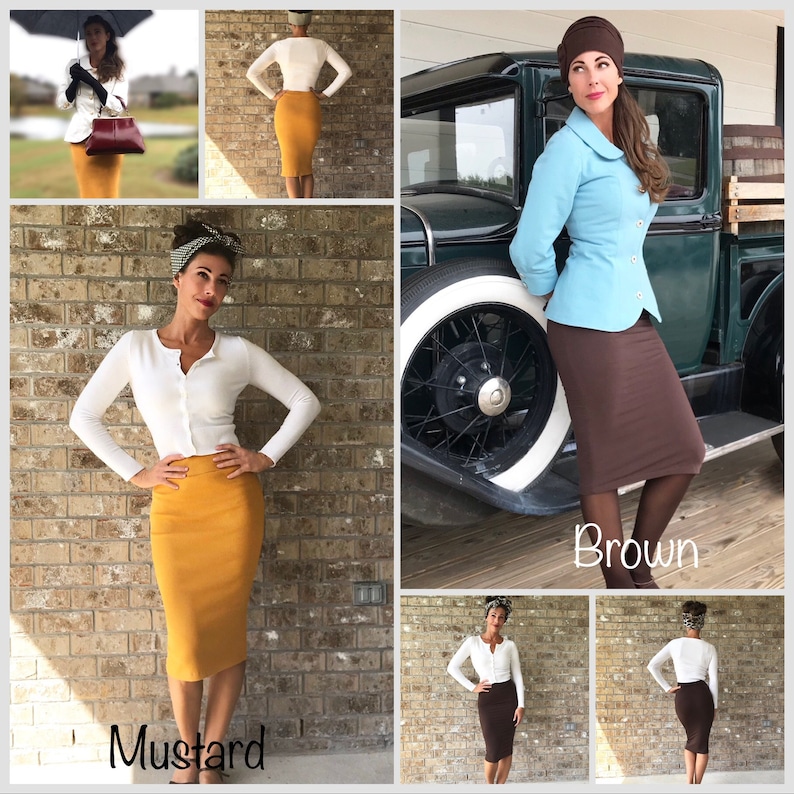 May include: A woman is wearing a white cardigan and a brown skirt. She is standing in front of a brick wall. The skirt is labelled "Brown". Another woman is wearing a white cardigan and a mustard yellow skirt. She is standing in front of a brick wall. The skirt is labelled "Mustard".