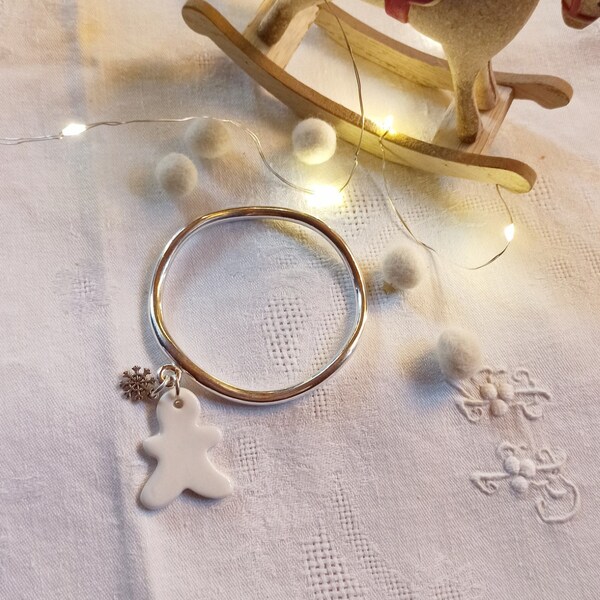 Irregular silver plated rush bracelet and Christmas charms, white handcrafted ceramic mannele medallion