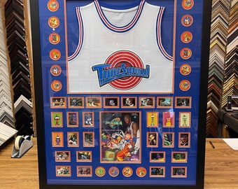 Michael Jordan Space Jam Tune Squad Jersey with collectible items framed