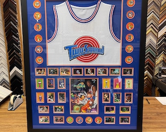 Michael Jordan Space Jam Tune Squad Jersey with collectible items framed