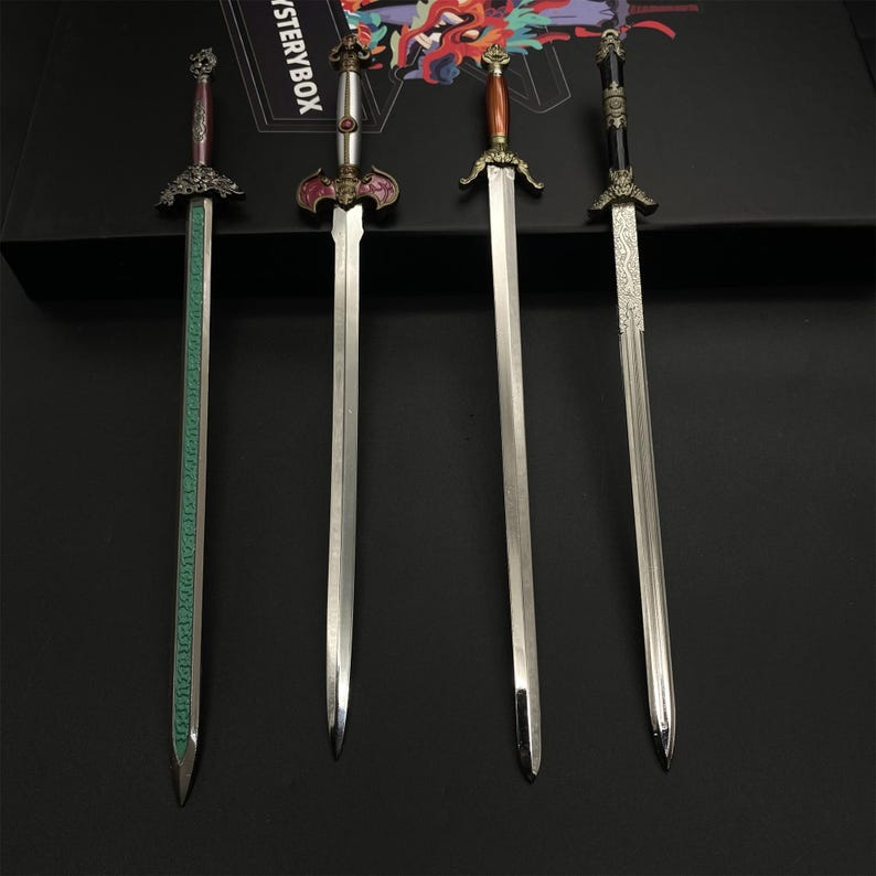 May include: Four decorative swords with ornate handles and silver blades are displayed against a dark background. The handles feature various colours and designs, including red, brown, and black. One sword has a green blade with engraved text.