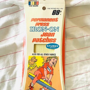 May include: Package of five assorted color iron-on jean patches, 4 1/2 inches by 5 1/2 inches. The package features a cartoon illustration of a girl on a seesaw. The text on the package reads "permanent press IRON-ON Jean patches" and "STURDY BRAND".