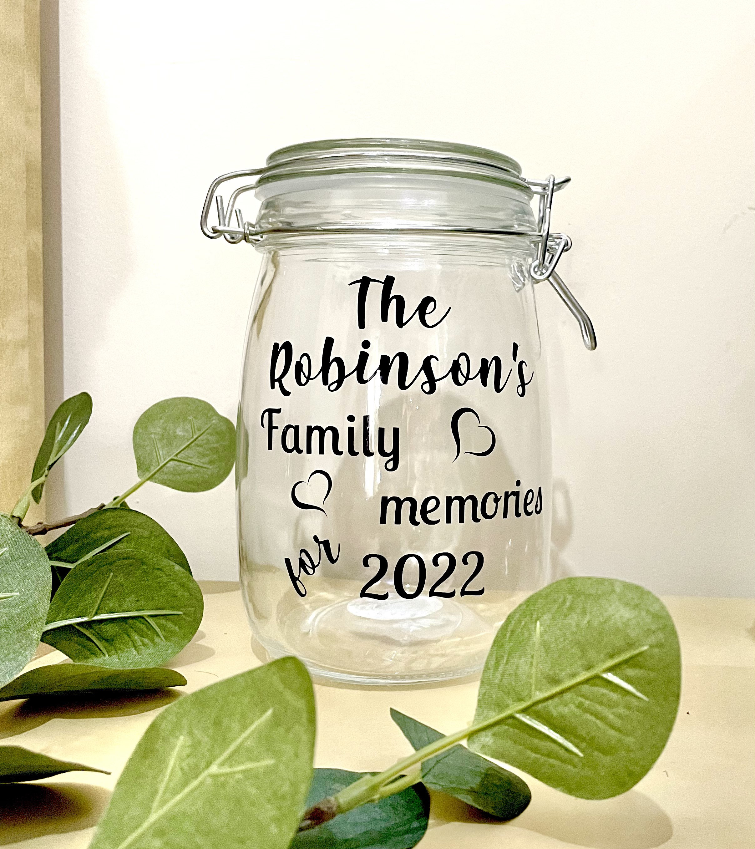 Personalised family memory jar filled with handwritten notes