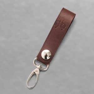 Quebec leather keychain