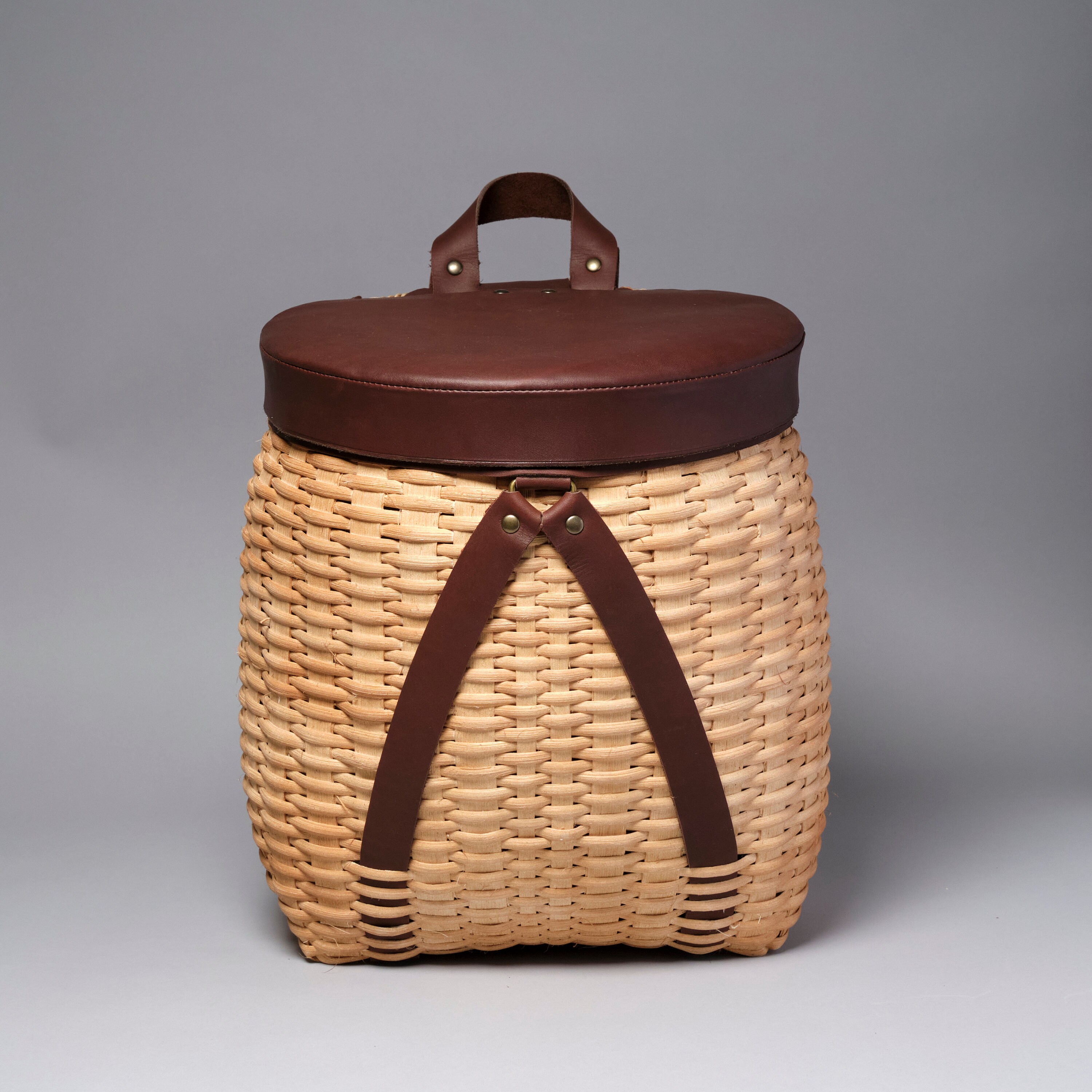 Adirondack basket with waterproof leather lid and strap