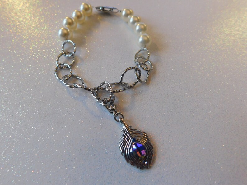 Swarovski feather bangle Clearance