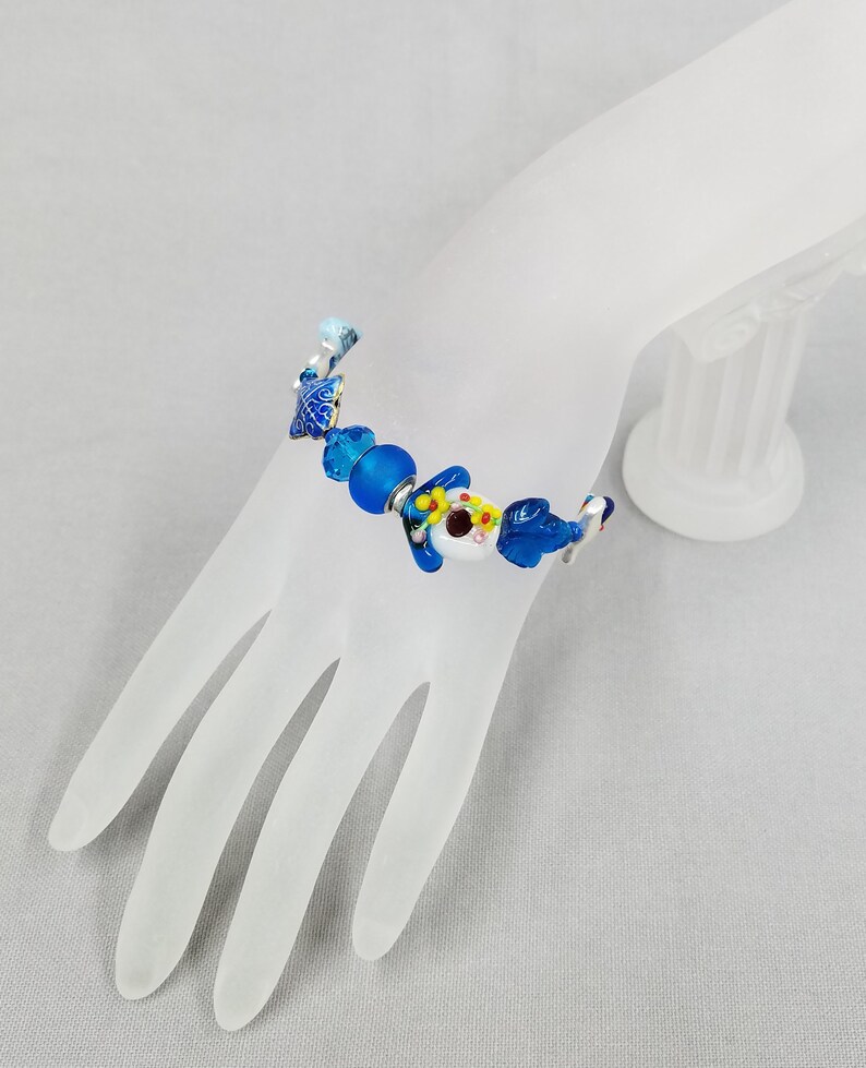 Lamp work glass birdhouse Blues Bracelet 34