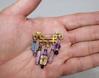 Gold tones and purples brooch pin 127