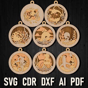 May include: Set of eight laser cut wooden ornaments featuring various sea creatures, including a whale, octopus, seahorse, and starfish. Each ornament is circular and has a delicate, intricate design.