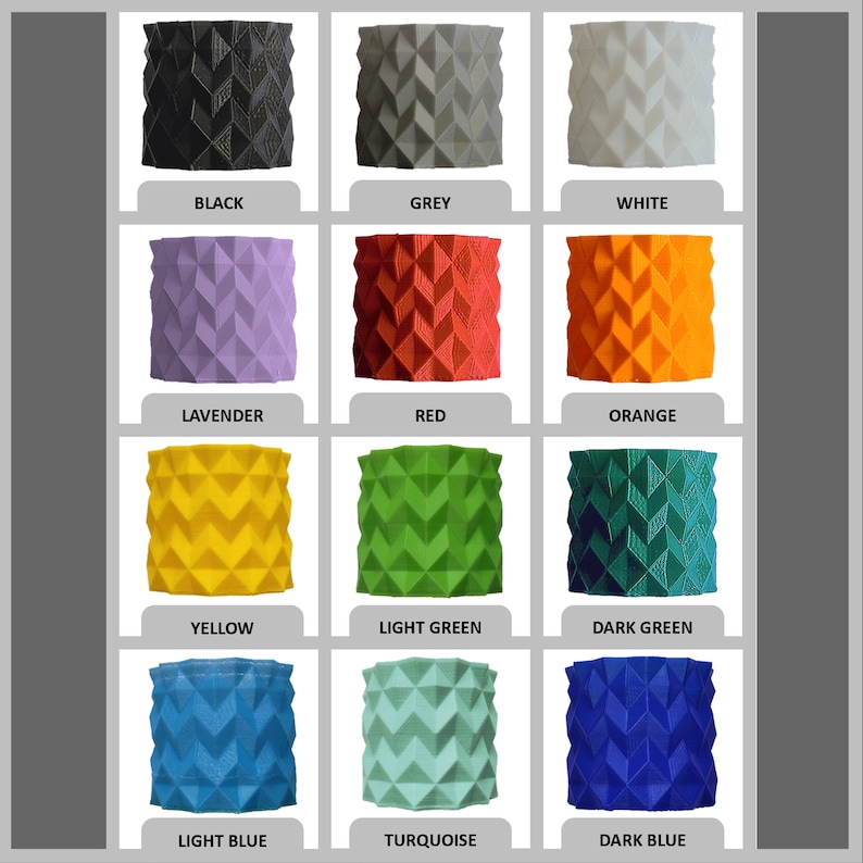 May include: A display of twelve geometric, textured containers in a range of colours. The colours are black, grey, white, lavender, red, orange, yellow, light green, dark green, light blue, turquoise, and dark blue. Each container is labelled with its colour.