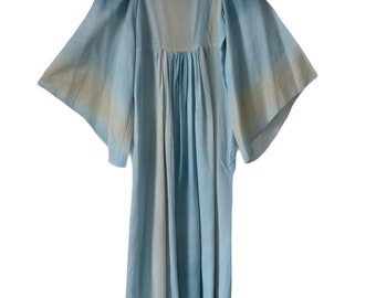 dress with wing sleeves