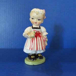 Norcrest Swiss Child Holds Pink Petal Flower in Each Hand - Lovely Vintage