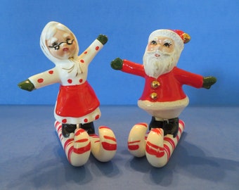 Santa and Mrs Claus on Candy Cane Ski's - Salt and Pepper Shaker Set of Two - Wonderful and Rare!