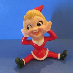 Kreiss Pixie Blonde Girl in Santa Suit - Sitting with Her Legs Spread - Hands Behind Her Ears! Excellent and Rare!