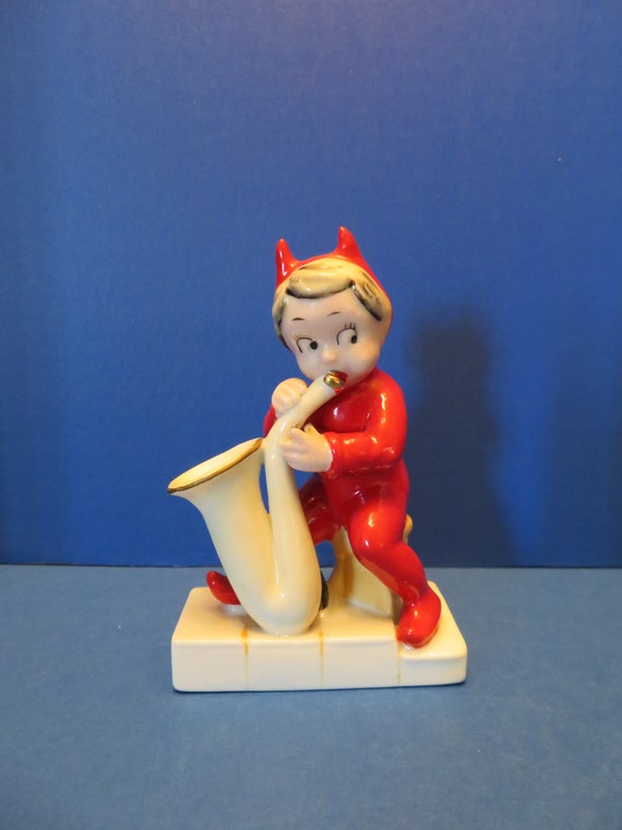 Ardalt Lenwile Jazz Devil Blowing the Saxophone While Tinkling the