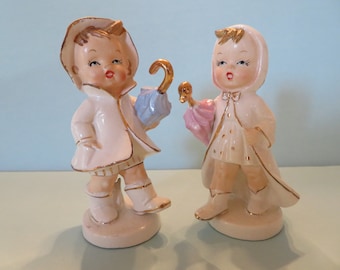 Napco April Showers Boy and Girl - Salt and Pepper Shakers - Each Wears Galoshes & Raincoat - Holding Umbrella - Excellent Vintage!!