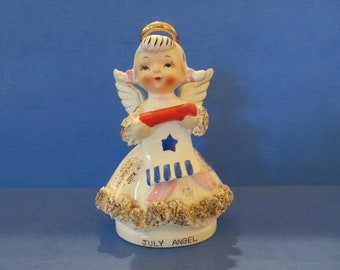 Lefton July Angel Holds Red, White and Blue Patriotic Banner - Wears White and Gold Spaghetti Trimmed Dress with Pink Sash